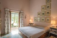 Łóżko lub łóżka w pokoju w obiekcie Villa con piscina tra Porto vecchio e Bonifacio