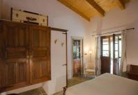 Łóżko lub łóżka w pokoju w obiekcie Villa con piscina tra Porto vecchio e Bonifacio