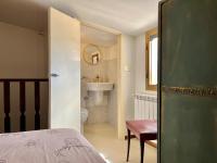 Posteľ alebo postele v izbe v ubytovaní I Due Gradoni Stone House