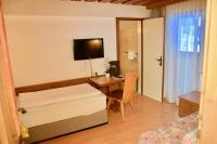 Posteľ alebo postele v izbe v ubytovaní Hotel Pension Alpengruß