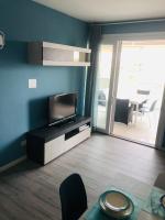A television and/or entertainment centre at Opalia Residence - Stella Garda Lake Lifestyle