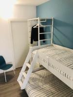 A bed or beds in a room at Opalia Residence - Stella Garda Lake Lifestyle