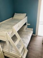 A bed or beds in a room at Opalia Residence - Stella Garda Lake Lifestyle
