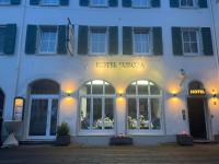 a store front of a building with the words hotel juocoa at Hotel Europa - Restaurant in Rüsselsheim