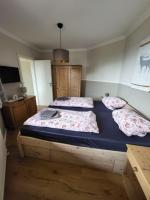 Postel nebo postele na pokoji v ubytování Appartement ZweiteHeimat