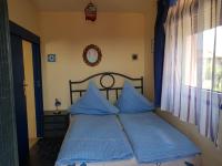 Postel nebo postele na pokoji v ubytování Villa Casa rosa Maria