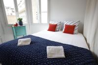 Posteľ alebo postele v izbe v ubytovaní Appartement spacieux 70m2 avec 2 chambres - Terrasse expo sud - Coeur de Cannes
