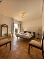 Posteľ alebo postele v izbe v ubytovaní Apartamentos Toledo Casa Galería de los Aljibes