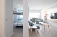 A bed or beds in a room at Global Properties, Apartamento con terraza y vistas a la costa mediterranea