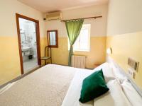 A bed or beds in a room at lidodubaihotel