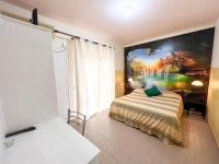 A bed or beds in a room at lidodubaihotel