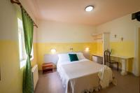 A bed or beds in a room at lidodubaihotel