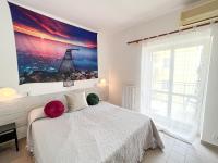 A bed or beds in a room at lidodubaihotel