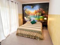 A bed or beds in a room at lidodubaihotel