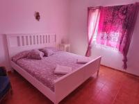Postel nebo postele na pokoji v ubytování Finca la fortaleza