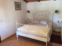 Postel nebo postele na pokoji v ubytování Sa Bassa Crua Agroturismo