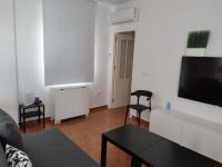 TV a/nebo společenská místnost v ubytování El Mirador del Coto, Apartamentos Living Sur