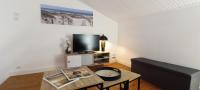 Televízia a/alebo spoločenská miestnosť v ubytovaní MER - Agreable appartement-place de parking privee