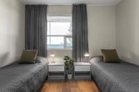 Postel nebo postele na pokoji v ubytování Bella Apartments & Rooms