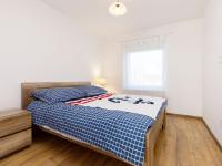 A bed or beds in a room at Holiday Home Honey by Interhome