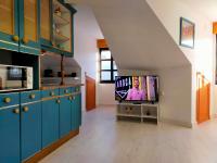 Kuchyň nebo kuchyňský kout v ubytování Apartamento en el casco antiguo de Ponferrada