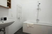A bathroom at Modern hotel-styled apartment in the second district of Vienna.