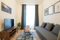 A television and/or entertainment centre at Modern hotel-styled apartment in the second district of Vienna.