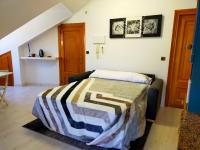 Postel nebo postele na pokoji v ubytování Apartamento en el casco antiguo de Ponferrada