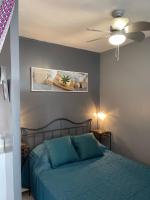 Łóżko lub łóżka w pokoju w obiekcie Appartement proche des Thermes