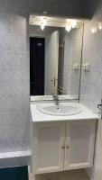 Łazienka w obiekcie Appartement proche des Thermes