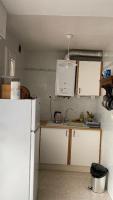 Kuchnia lub aneks kuchenny w obiekcie Appartement proche des Thermes