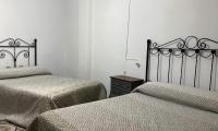 Posteľ alebo postele v izbe v ubytovaní CASA FUENTE DEL MOLINO DE LA IRUELA