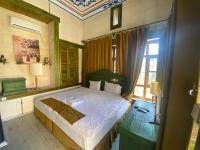 A bed or beds in a room at HANEHAN