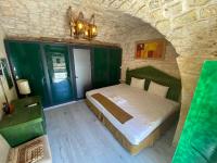 A bed or beds in a room at HANEHAN