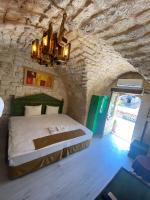 A bed or beds in a room at HANEHAN