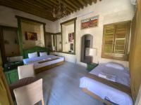 A bed or beds in a room at HANEHAN