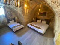 A bed or beds in a room at HANEHAN