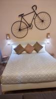 A bed or beds in a room at Glam Resort Luxury Lorenzo