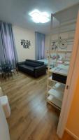 A bed or beds in a room at Glam Resort Luxury Lorenzo