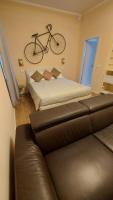 A bed or beds in a room at Glam Resort Luxury Lorenzo