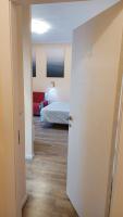 A bed or beds in a room at Glam Resort Luxury Lorenzo