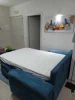 Posteľ alebo postele v izbe v ubytovaní Residenza sul Mare
