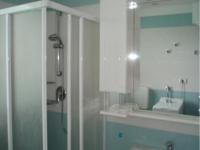 A bathroom at Lovely beachside flat - Beahost