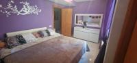 A bed or beds in a room at Casa Roda de Bará & Spa