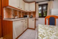 Kuchyň nebo kuchyňský kout v ubytování Apartments Juric