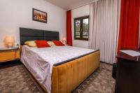 Postel nebo postele na pokoji v ubytování Apartments Juric