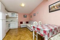 Kuchyň nebo kuchyňský kout v ubytování Apartments Juric
