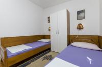 Postel nebo postele na pokoji v ubytování Apartments Juric