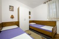 Postel nebo postele na pokoji v ubytování Apartments Juric