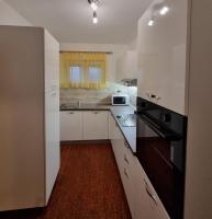 Kuchyň nebo kuchyňský kout v ubytování Apartments Silvana 597